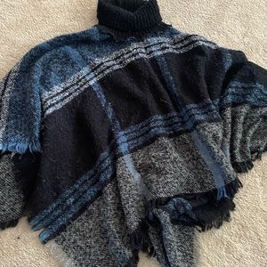 Black and blue poncho.